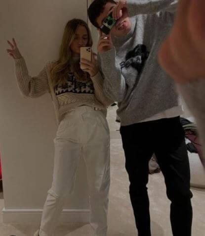 Katrine Friis with her boyfriend Andreas Christensen clicking a selfie in the mirror.